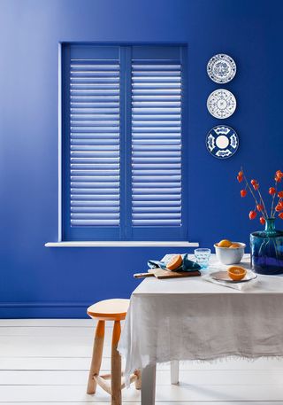 3 CB Lindos Blue Shutters Lifestyle