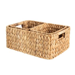 A light brown woven rectangular storage box