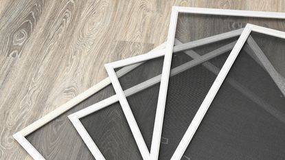 Window screens on floor