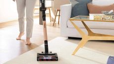 Cordless Shark vacuum on carpet