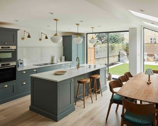 large kitchen with kitchen island base board