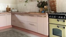 The Otto House pink kitchen with fluted kickboards